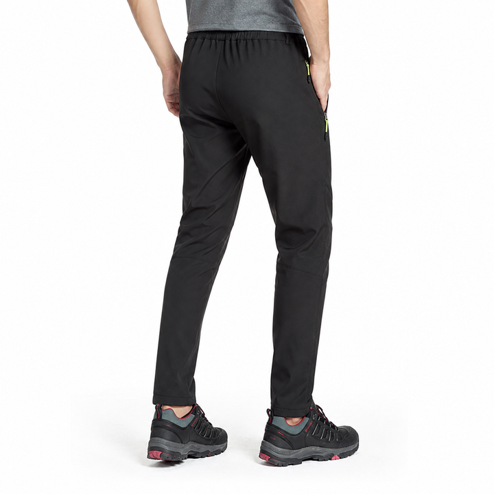 Men's fleece-lined windproof hiking pants in black, rear view